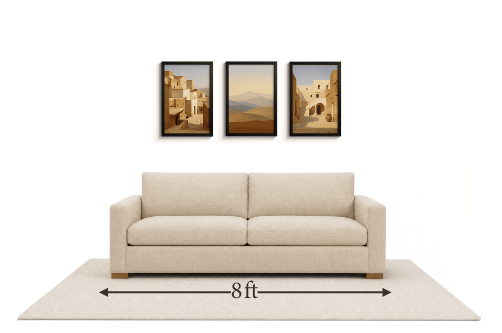 Large gallery wall above an 8 ft couch
